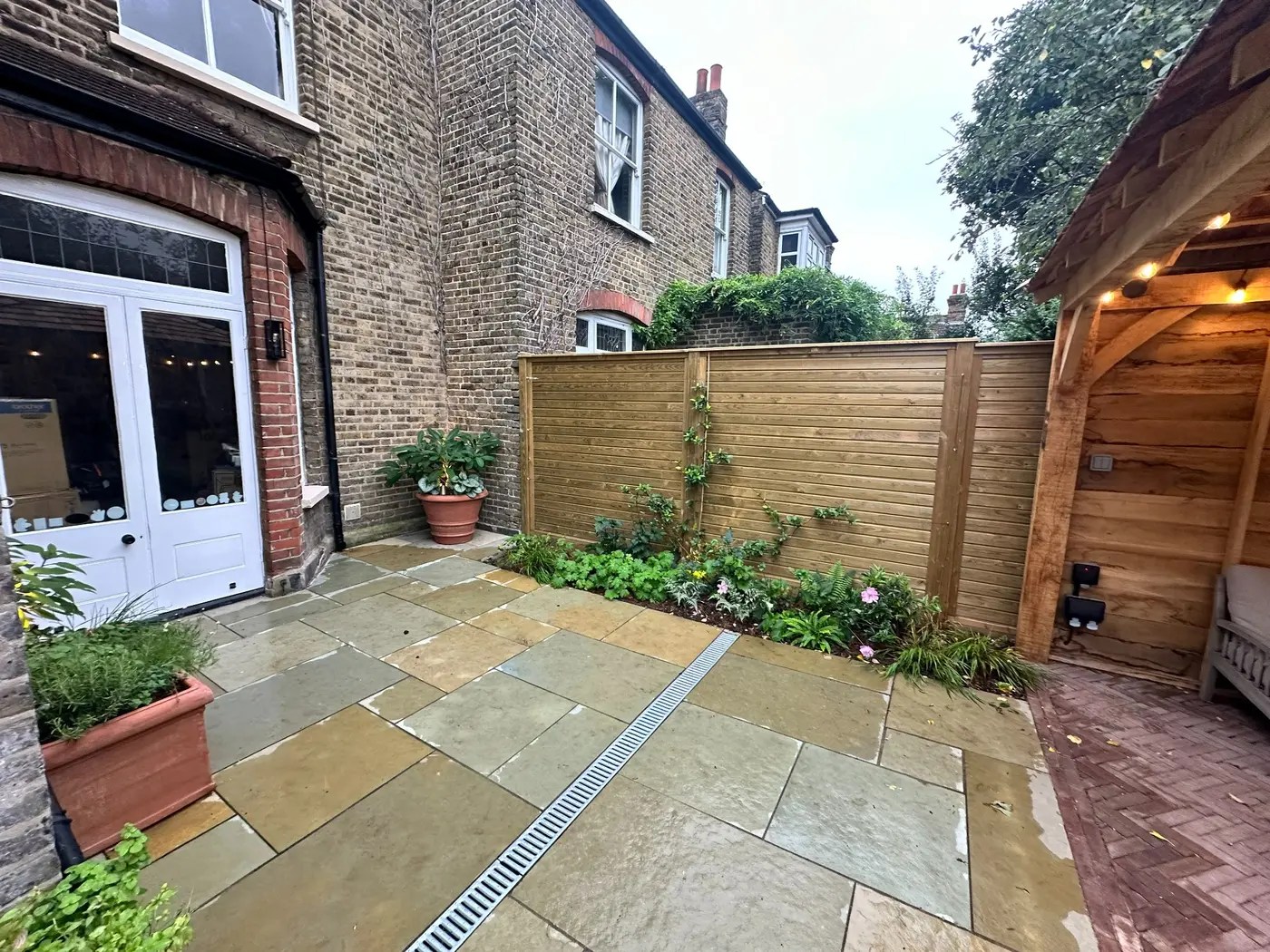 Jacksons Fencing panels installed within a landscaped Lewisham garden.