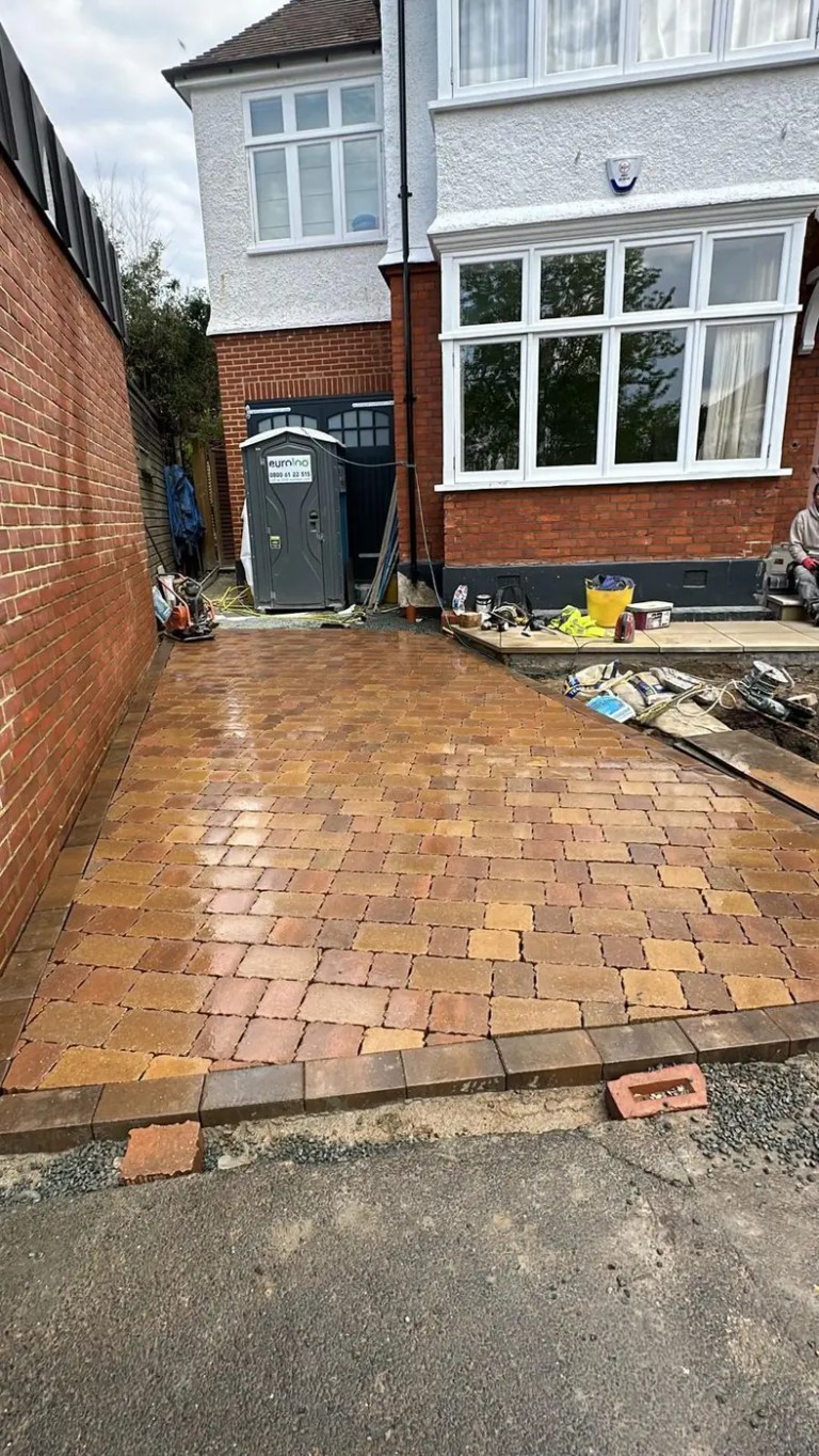 Permeable block paving being installed during a driveway project in Dulwich.