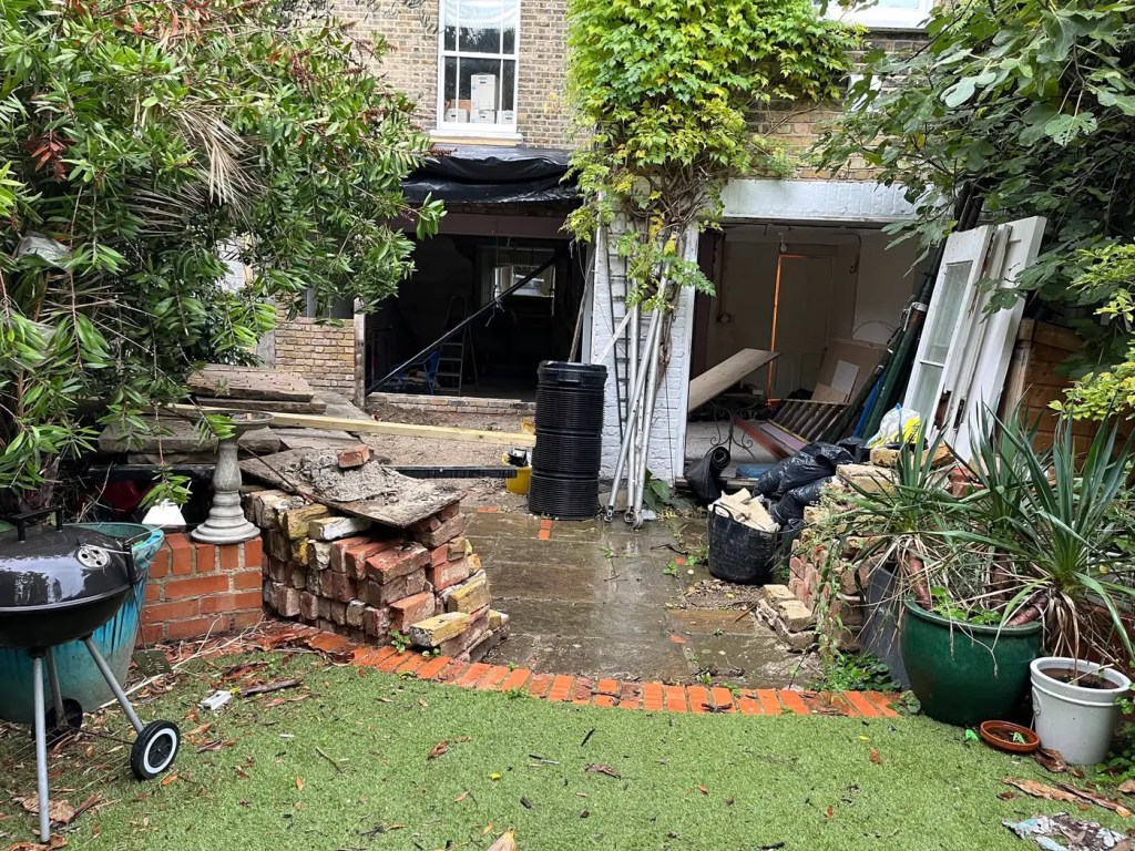 Original garden layout and connection to the house before the Lewisham landscaping project.