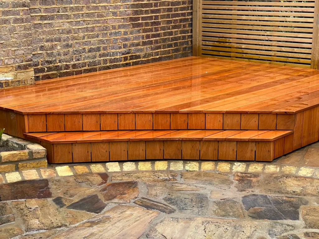 Detailed view of timber decking with carefully finished steps and board edges.